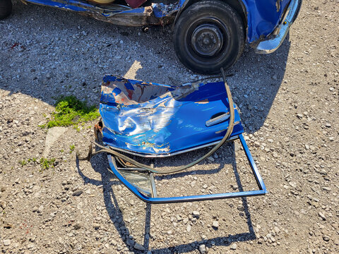 Road car accident. The car crashed. The car damege. The wheel came off. Broken minibus. Overturned car.  The car overturned. The car rolled over onto its roof. 