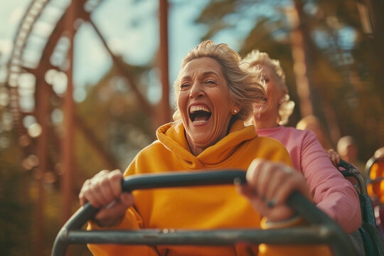 Senior woman enjoying roller Coaster ride