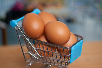 Grocery shopping with luxurious eggs filling, topping up your cart, symbolizing upscale living and...