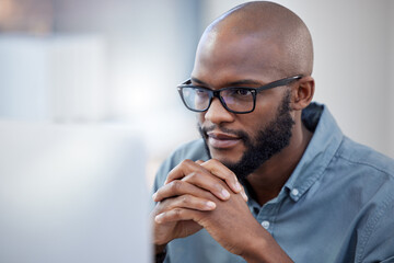 Black man, thinking and work or office for business, employee and online research for company on...