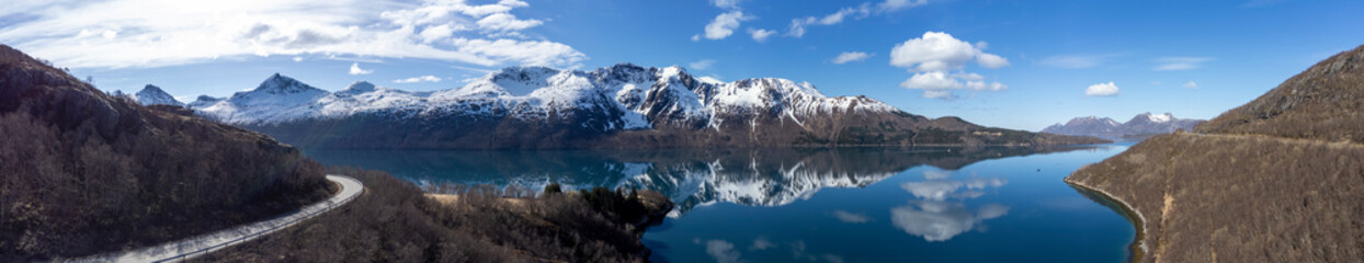Panoramic drone view of Holandsfjord and Nordfjord in Nordland county. In the background is the...