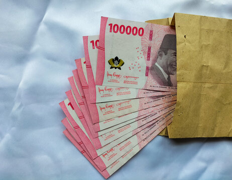 Top view of Indonesian rupiah note. Indonesian Rupiah the official currency of Indonesia. New Uang Rupiah Indonesia. Bank Indonesia. Flat lay, high angle view. 