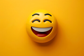 Laughing emoji face, yellow background