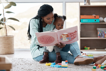 Home, baby and mother reading a book, relax and bonding together with happiness, learning and...
