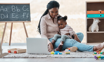 Mother, child and laptop together in home for e learning, entertainment or video streaming in...