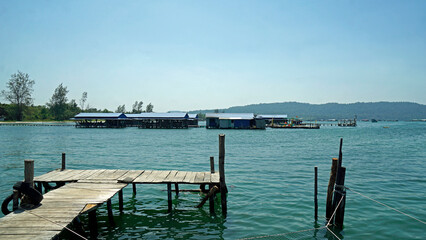Fototapeta premium restaurant on piles in the bay near starfish beach