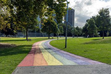 Rainbow coloured path, winding through a public park, in Sydney, Australia. It symbolises inclusion...