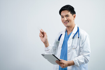 Doctor working on a digital tablet in hospital.