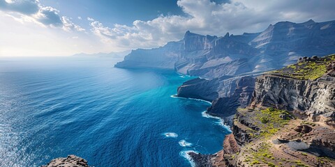 Massive cliffs in the southern area resemble the landscapes of Gran Canaria or a similar...