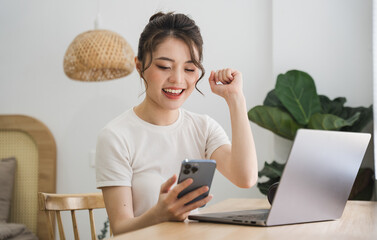 Portrait of asian girl working at home