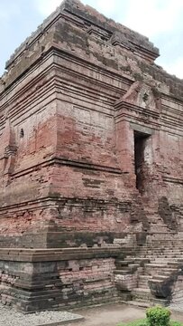 Front and left-side views of the ancient Pari Temple building. Pari Temple, which was founded in 1371 during the Majapahit Kingdom, is located in Porong District, East Java, Indonesia.