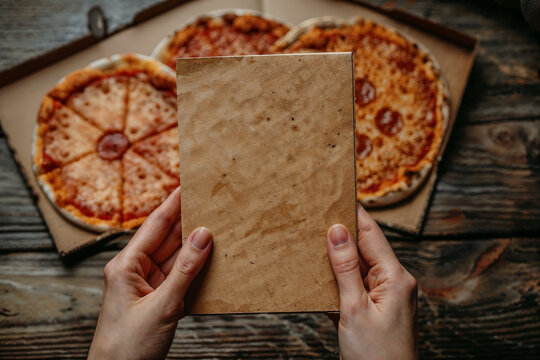 Pizza menu mockup with hands and pizzas. Generative AI