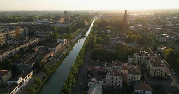 Naviglio del Brenta (Brenta Canal) Along The Mira Municipality at Sunrise In Metropolitan City of Venice, Italy. - aerial shot
