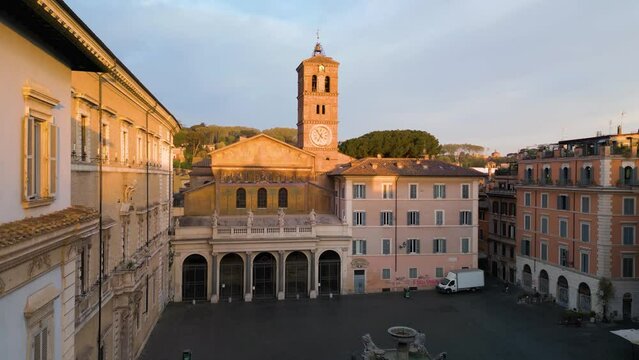 Drone Ascends to Reveals Basilica of Our Lady in Trastevere in Main Piazza. Rome, Italy