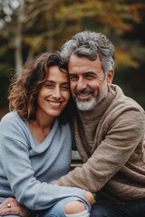 Fototapeta premium Mature Couple Sitting on Wooden Bench