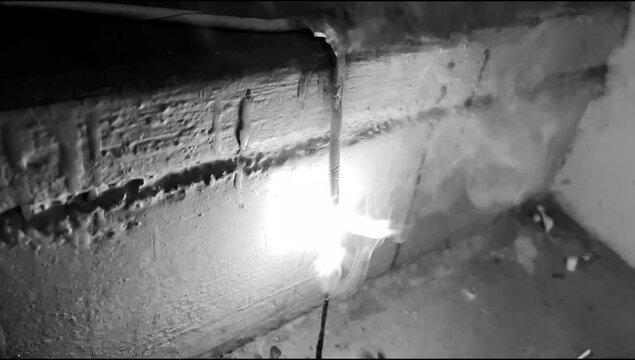 Extreme close up and slow motion of a rope cracker sparkling