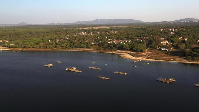 Lagoa de Albufeira Aerial view, natural lake meeting the Atlantic Ocean fishing boats on a lake near the atlantic ocean