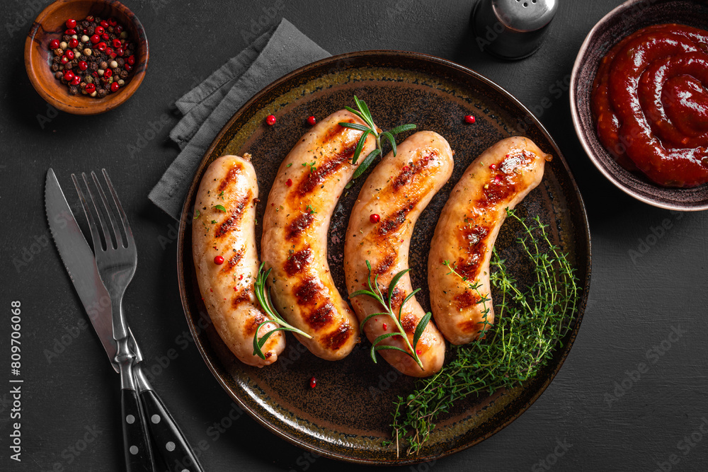 Wall mural grilled sausages with tomato sauce