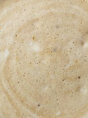 Texture of coffee foam. Cappuccino with foam