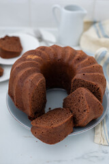 Chocolate bundt cake with slice cut
