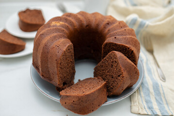 Chocolate bundt cake with slice cut