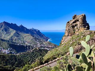 Obraz premium A moutain valley nature view from Leon de Taganana viewpoint. Anaga mountains and ocean coast landscape. Canary Islands, Tenerife, Spain