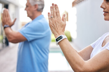 Fototapeta premium Yoga, calm and hands of senior couple in garden for mindful, body and spiritual wellness at home. Relax, health and elderly man and woman in retirement with meditation exercise for balance outdoor.