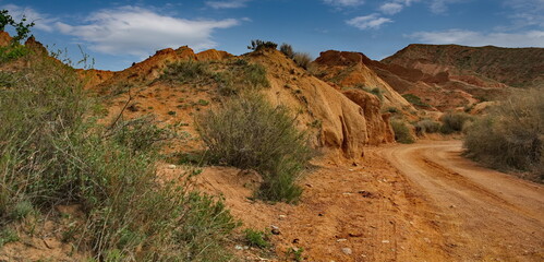 Northern Kyrgyzstan. Picturesque views of the famous Skazka Canyon (, the clay mountain peaks of...