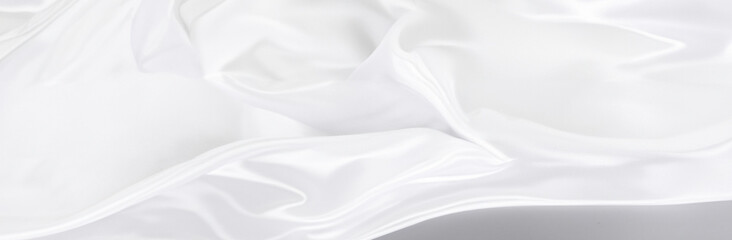 White Silver Satin Fabric Texture Background with Soft Blur Pattern