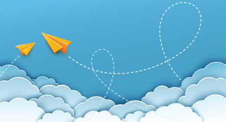Two yellow origami paper plane with dash line track with loop in the