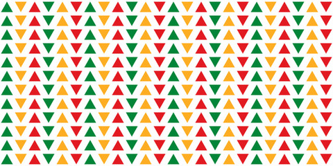Seamless pattern with red, yellow and green triangles neatly aligned in columns on a transparent background. A simple solid pattern for wrapping paper, pillows, etc. Vector illustration