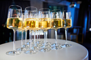 Set of glasses with white wine on a buffet table