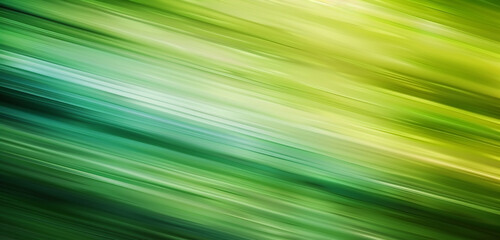 Obraz premium Blurred abstract background transitioning seamlessly from emerald to lime.