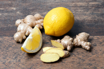 Ginger and lemon on wooden table