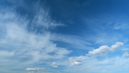 Fototapeta premium Beautiful blue sky with clouds background. Sky with clouds weather nature cloud blue. Timelapse.