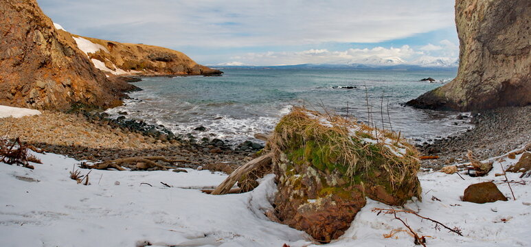 Russia. The Far East. The Kuril Islands. The picturesque rocky coast of Iturup Island in the Sea of Okhotsk.