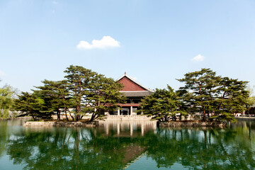 Naklejka premium View of the traditional wooden pavilion on the lake in the palace