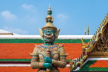 Sculpture of a giant guarding at the gate of the temple of the Emerald Buddha, Bangkok 2