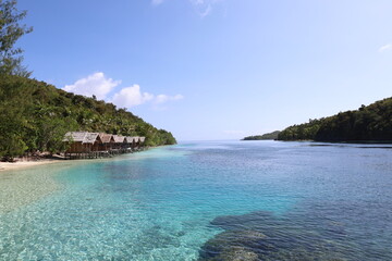 Fototapeta premium View of typical bamboo houses in West Papua, Raja Ampat archipelago
