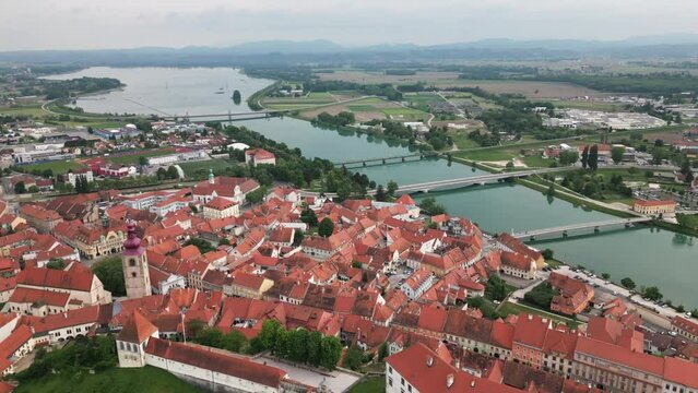 Drone view of the Drau river, lake Ptuj from and the old town