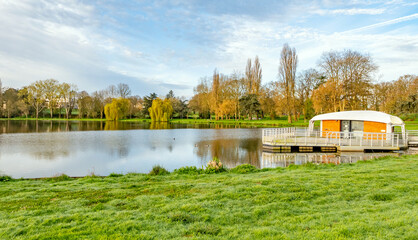 Fototapeta premium Châteaubriant, Pays de la Loire, France: Bar over the lake at Etangs de Choisel (Choisel Ponds)