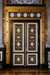 Luxurious old palace door decorated with ivory.