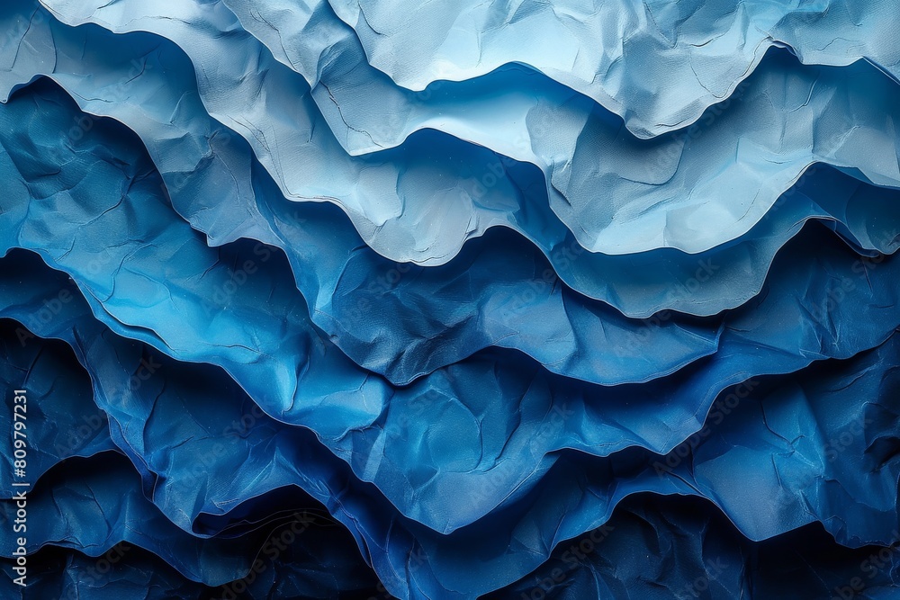 Poster the image shows a textured pattern of layered wavy blue paper, reflecting complexity and fluidity in