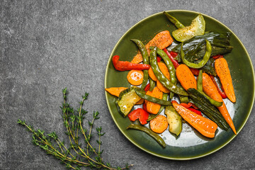 Asian food. Plate of stir fry vegetables. Fried zucchini, green bean, carrots, pepper. Healthy diet concept.