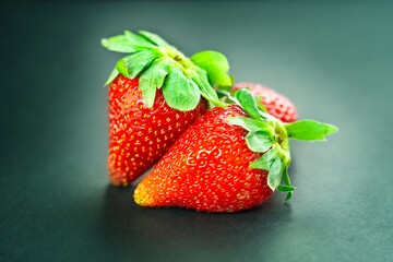 strawberries in a grey background