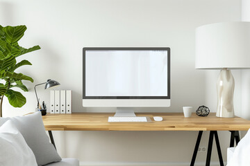 Against a backdrop of modern elegance, a wooden desk in a white-themed living room displays an empty computer mockup, inviting viewers to envision their own content on the pristine