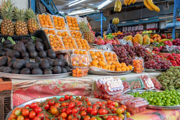 Bazaar selling summer fruits in shop showing plenty types of fruits and variations of choices