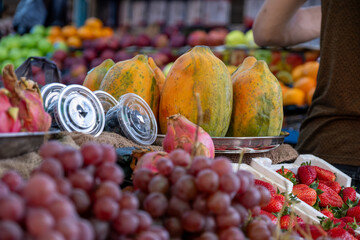 Bazaar selling summer fruits in shop showing plenty types of fruits and variations of choices