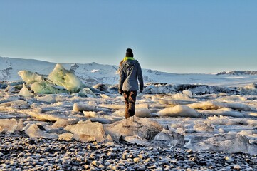 Woman walking on the Glacier in Iceland