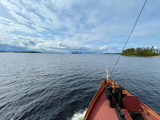 Steam boating on the lakes in Finland